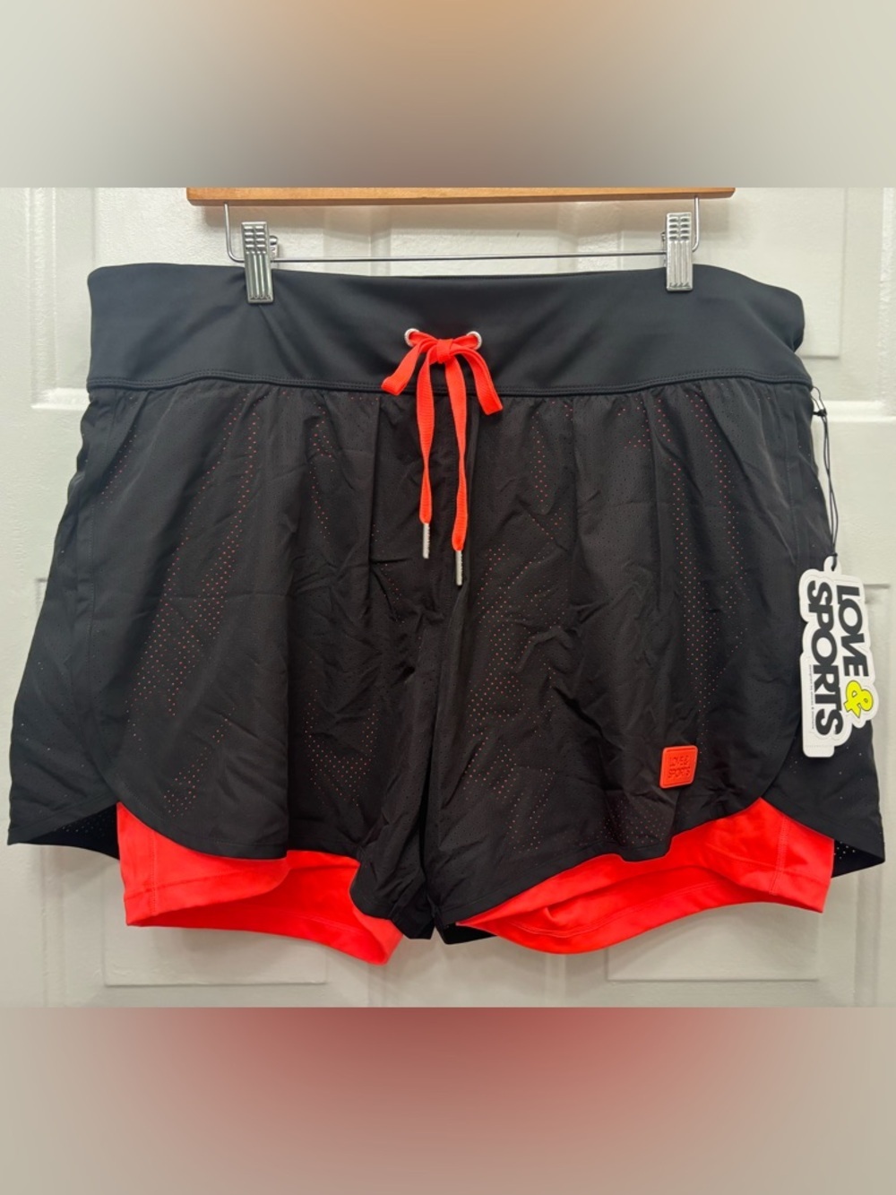 Black Athletic Layered Shorts with Coral Accent